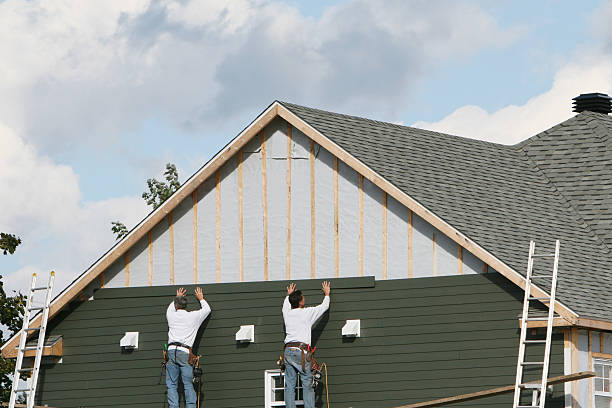 Professional Emergency Siding Repair technician working in Cumberland, MD